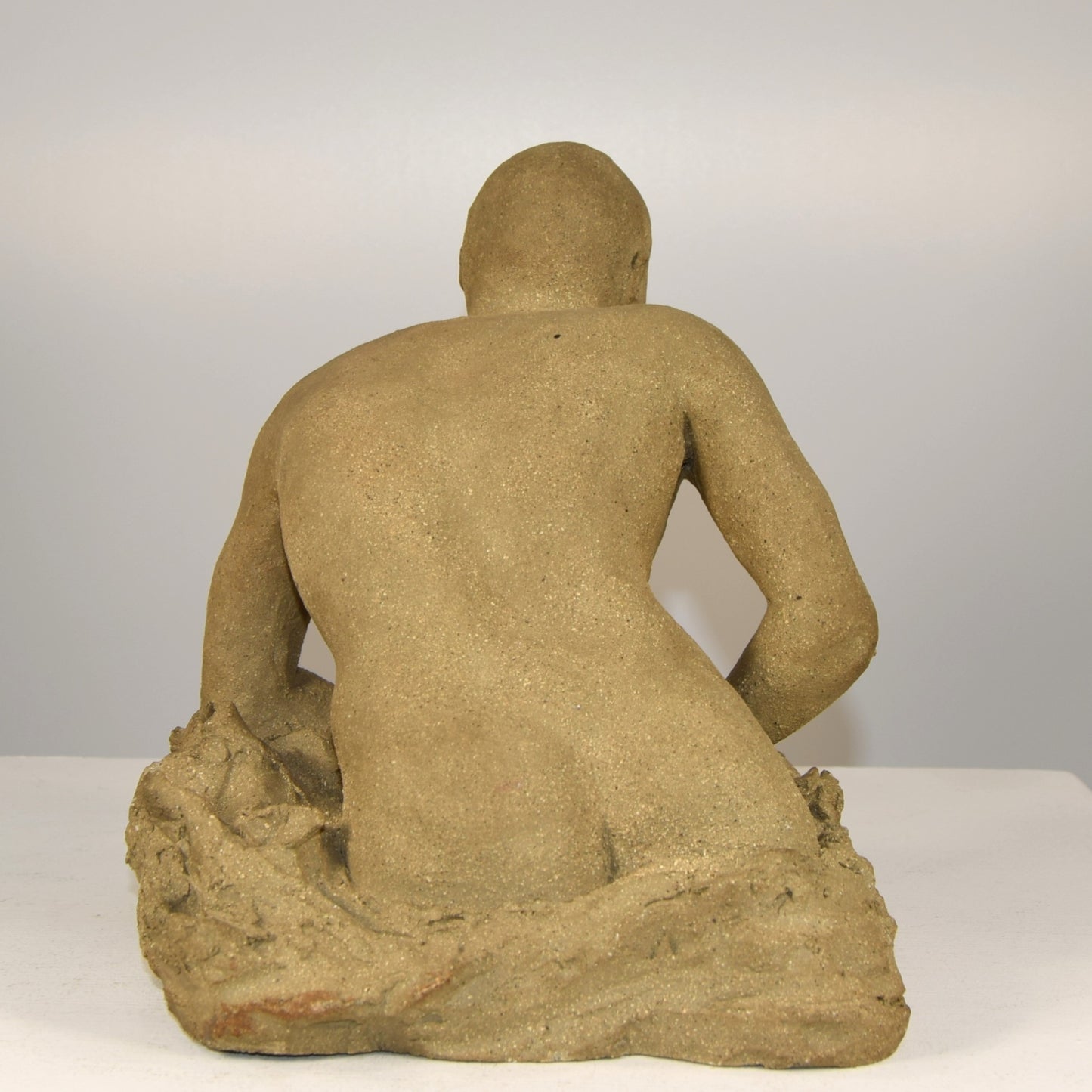 Stoneware Male Emerging Signed  JB  Dated 1991