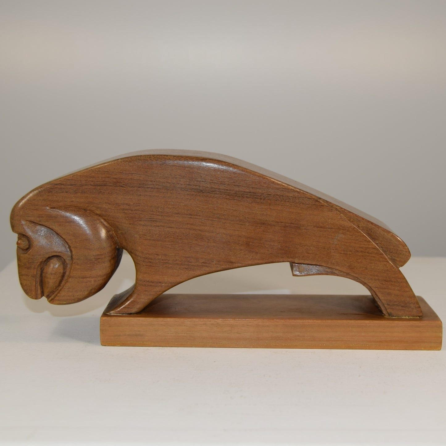 Mid Twentieth Century Modernist Ram in Walnut signed 'Clarke'