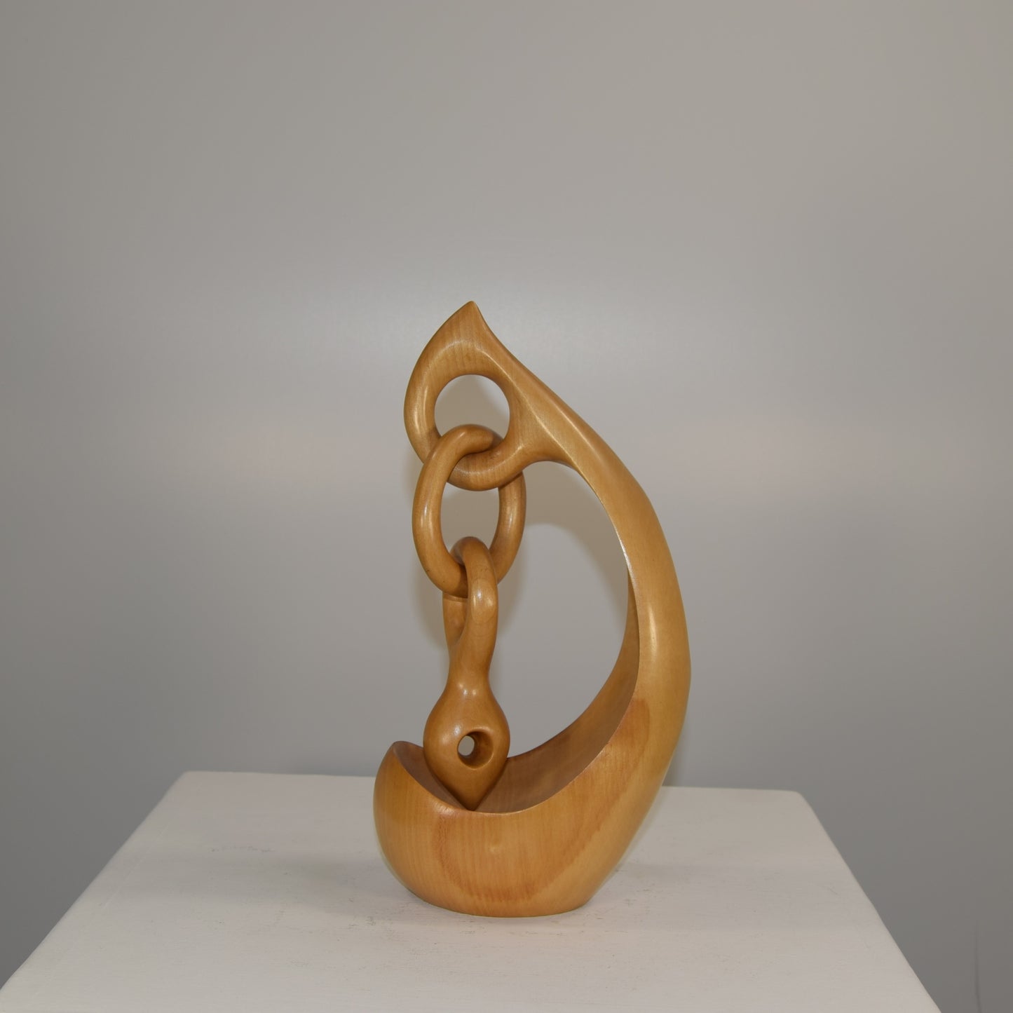 Abstract Form in Lime Wood Titled 'Suspension'