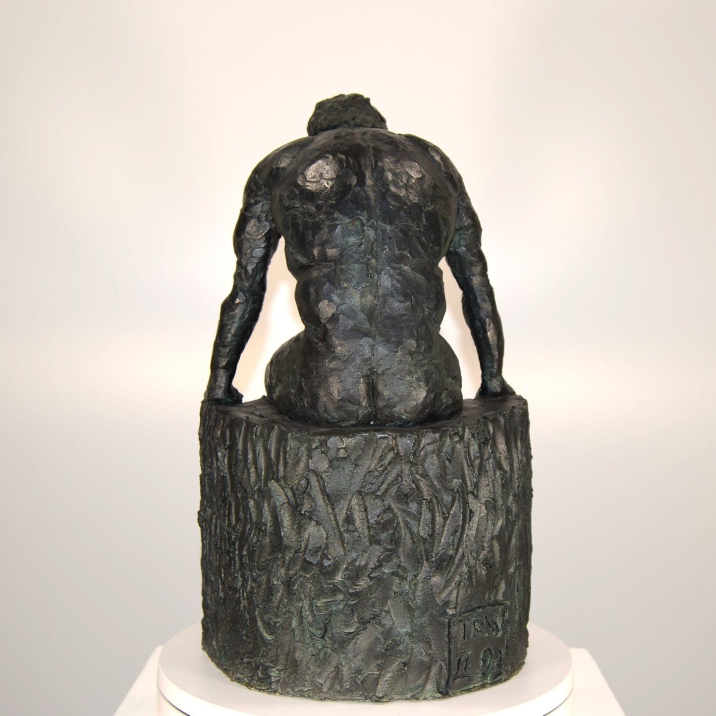 Seated Male Nude in Clay Signed T R W dated 1993