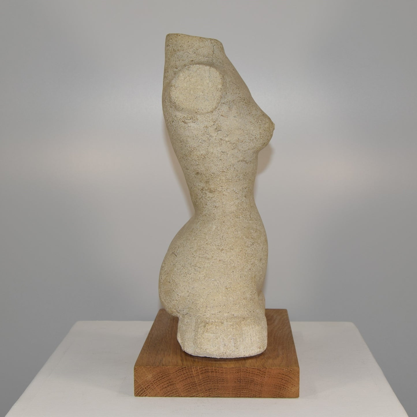 Female Torso in Portland Stone signed MM