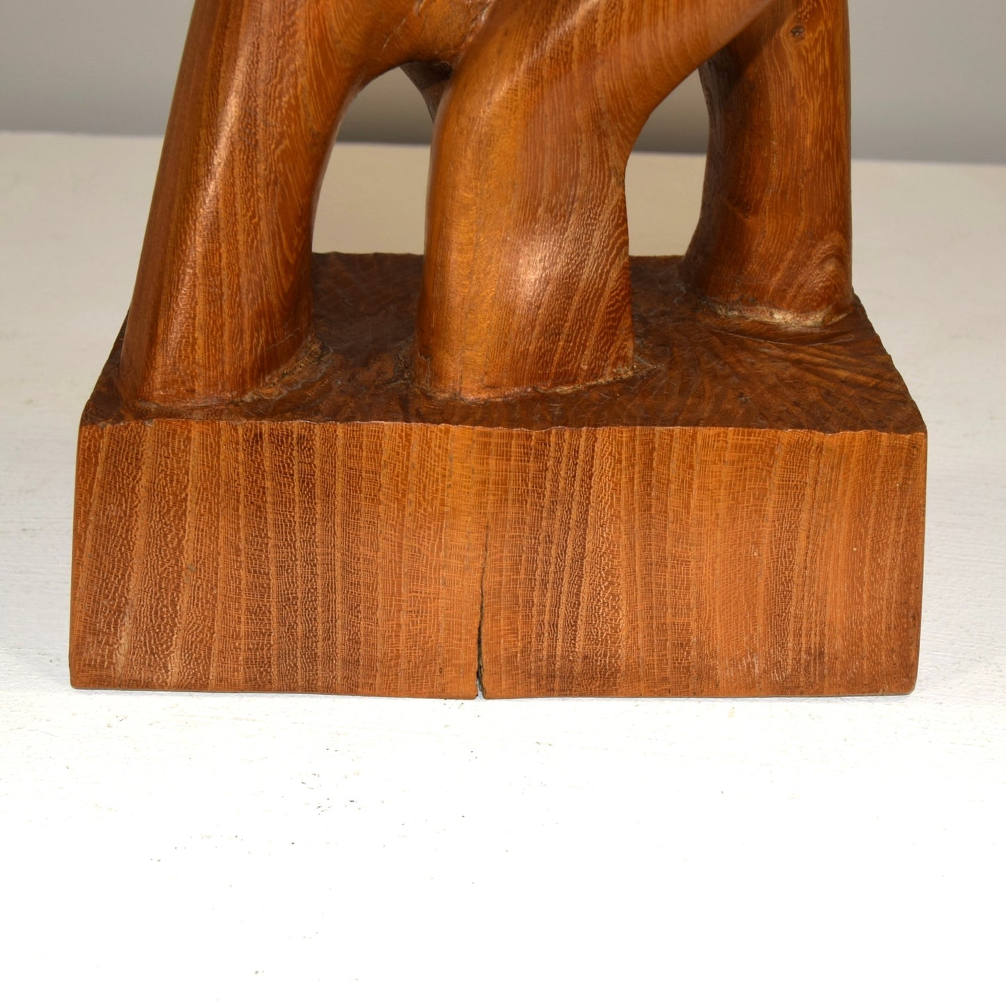 Abstract Embracing Backstabbing Figures in Oak