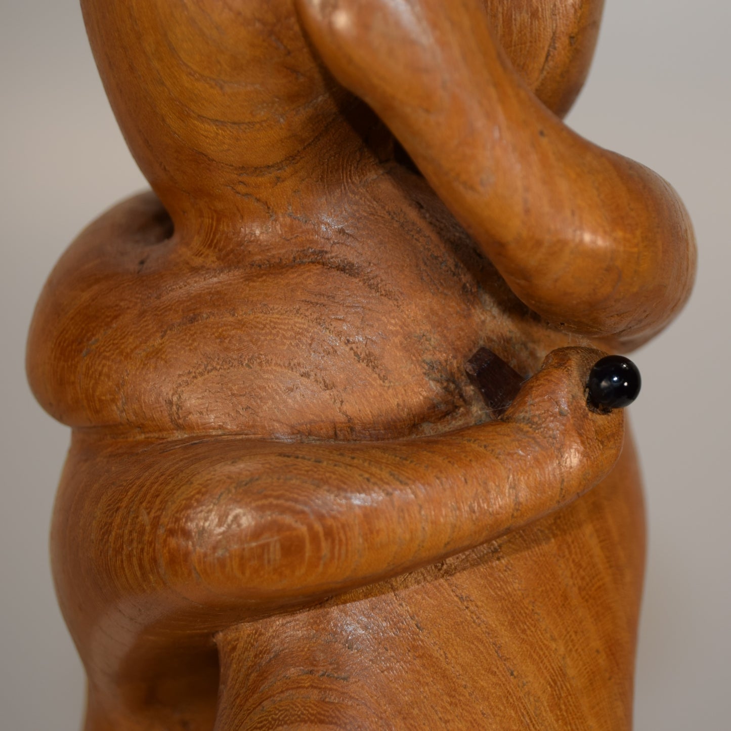 Abstract Embracing Backstabbing Figures in Oak