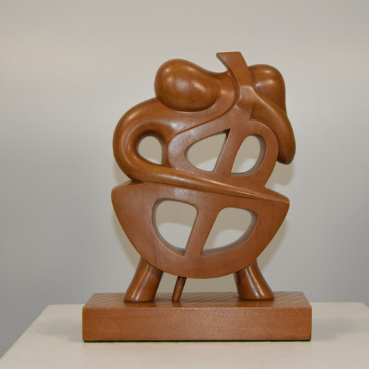 J Owens Abstract Cellist in Fruit Wood dated 1980