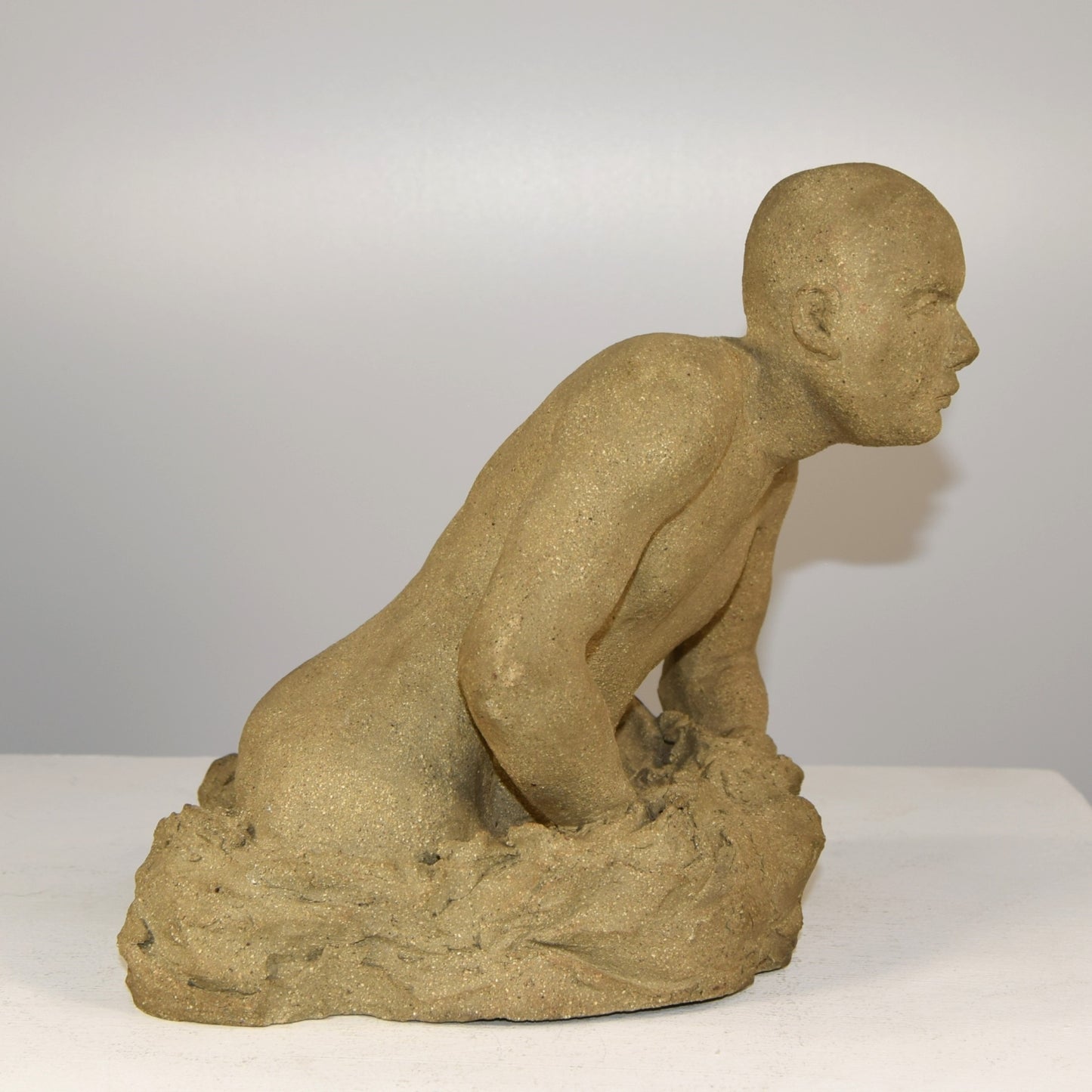 Stoneware Male Emerging Signed  JB  Dated 1991